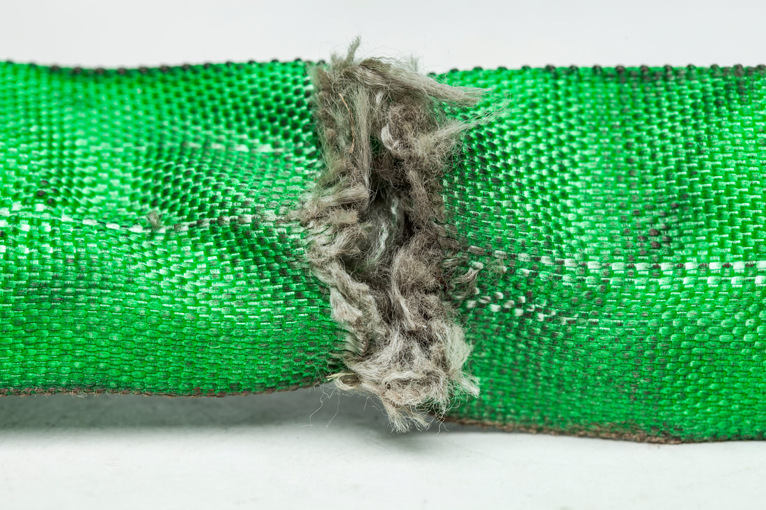 Example of cut exposing core yarn