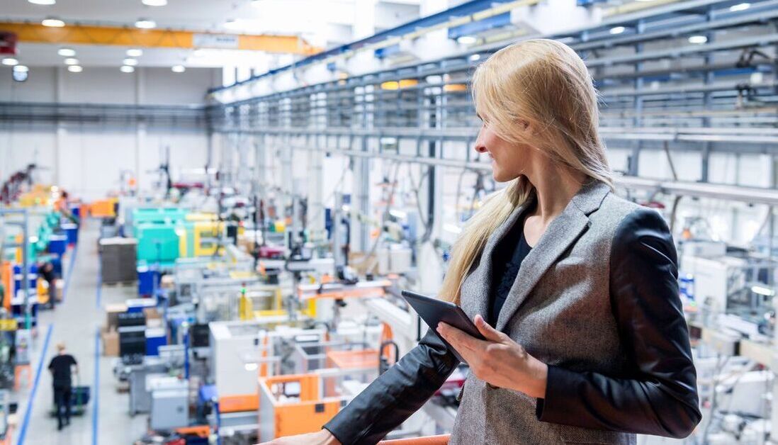 Woman in manufacturing facility