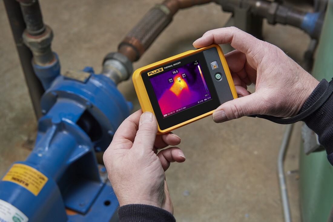 Person holding thermal camera