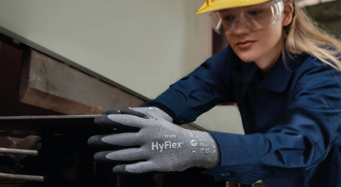 Employee wearing Ansell gloves