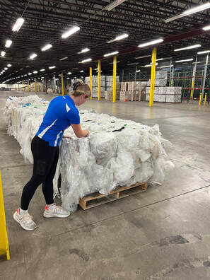 Fastenal employee by plastic wrap